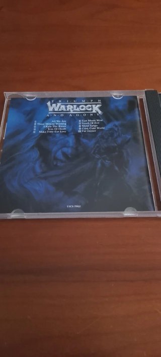 CD Warlock Triumph And Agony como nuevo con obi