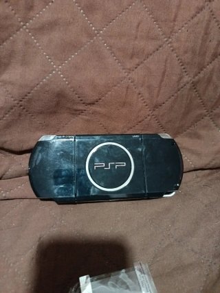 PSP Slim 2000 Negra + Accesorios leer