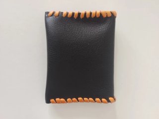 Monedero de cuero cosido a mano