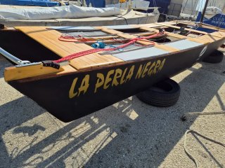 Catamaran tipo Patin a vela, de madera,como NUEVO.