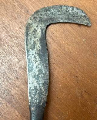 Podón antiguo de mano