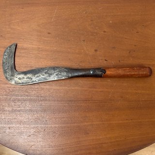 Podón antiguo de mano