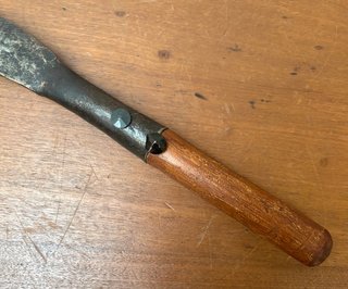 Podón antiguo de mano