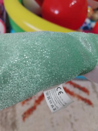 Peluche de delfín verde brillante