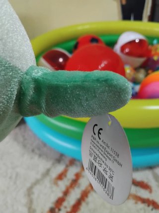 Peluche de delfín verde brillante