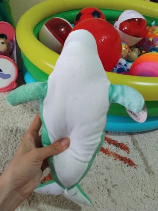 Peluche de delfín verde brillante