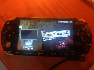 PSP 2004 Negra con Cargador y Tarjeta