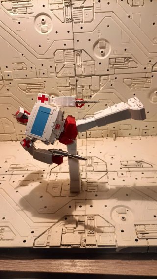 X-Transbots Ratliff (Ratchet) Figura Coleccionista