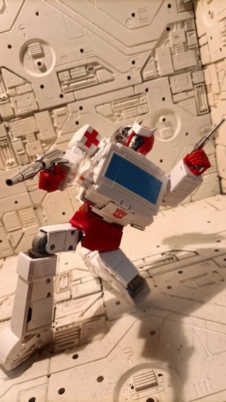 X-Transbots Ratliff (Ratchet) Figura Coleccionista