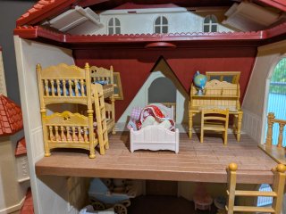 Lote Sylvanian: 2 casas, muebles y familias
