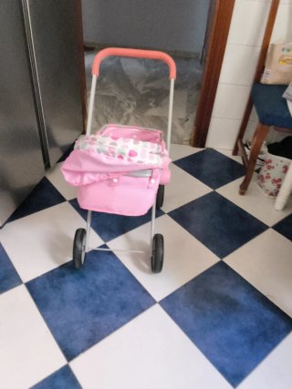 Cochecito de muñecas rosa