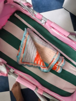 Cochecito de muñecas rosa