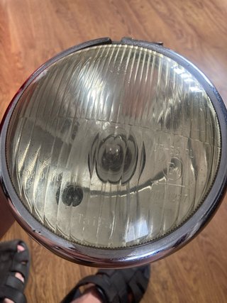 Faro delantero moto clásico cromado