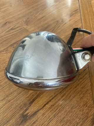 Faro delantero moto clásico cromado