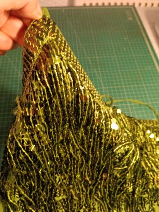 Blusón verde con flecos y lentejuelas