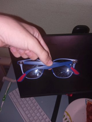 Estuche Gafas Ray-Ban Negro y gafas.