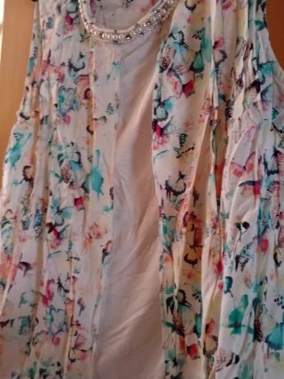 Blusa sin mangas con pedrería