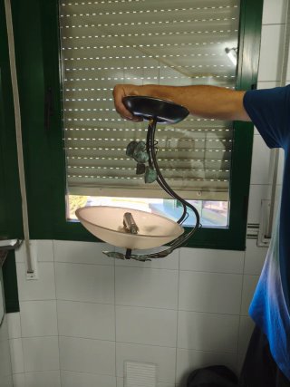 Lámpara de cristal y metal dorada