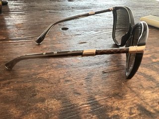 Gafas de sol Jimmy Choo negras y doradas