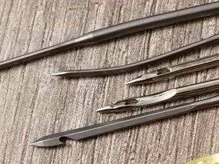 Agujas de coser y dedales