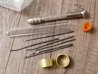 Agujas de coser y dedales