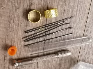 Agujas de coser y dedales