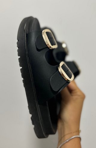 Sandalias Birkenstock negras y doradas