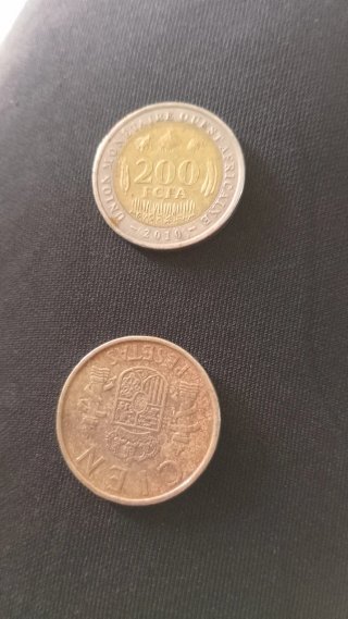 100 pesetas y 200 francos