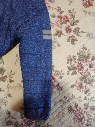 Chaqueta infantil azul con forro rojo