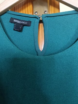 Blusa asimétrica sin mangas
