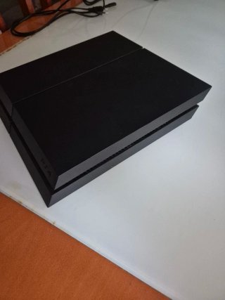 PlayStation 4 + Mando NO original.
