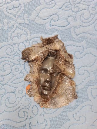 Máscara de pared de cerámica