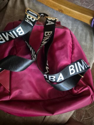 Mochila multibolsillos roja