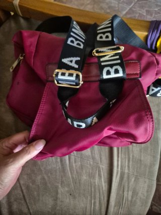 Mochila multibolsillos roja