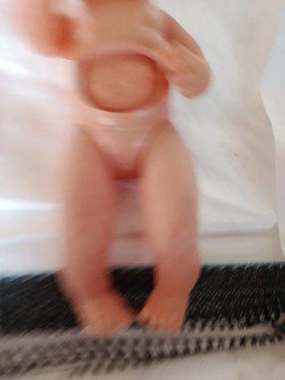 Muñeca bebé de plástico