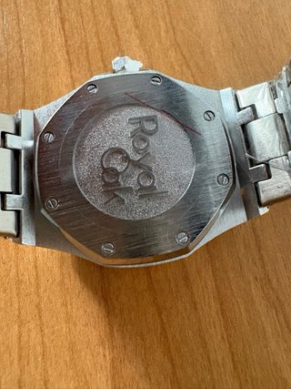 Reloj Verde y Plateado