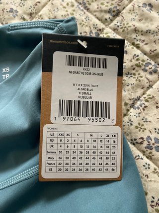Mallas The North Face chica color azul verdoso