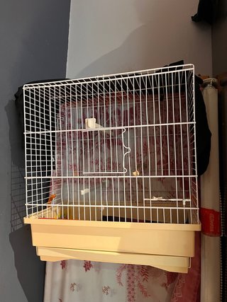 Jaula para pájaros blanca y beige