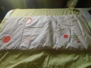 Protector y colcha para cuna