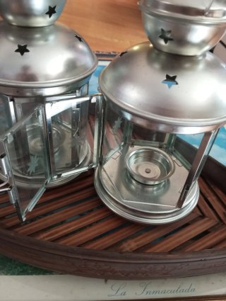Farolillos portavelas plateados con estrellas