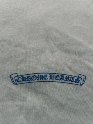T-shirt  bianca e azzurra taglia s che fitta m