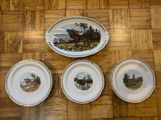 Juego de platos de porcelana con temática de caza