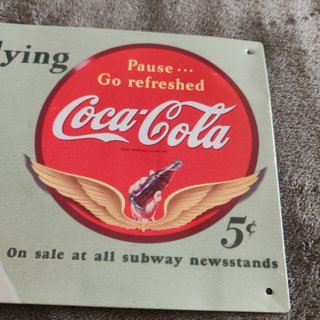 Placa Coca-Cola Sends thirst flying