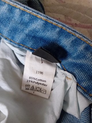 Pantalones vaqueros campana con abertura