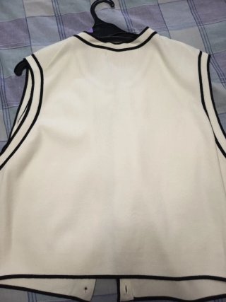 Chaleco crema  y negro talla XL
