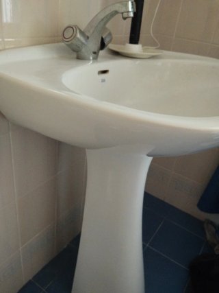 Lavabo de porcelana blanco