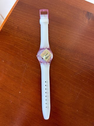 Reloj Swatch con retrato de mujer