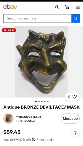Máscara metálica. Objeto decorativo de colección.