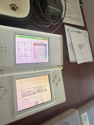 Nintendo DS Lite Blanca + Accesorios y Juegos