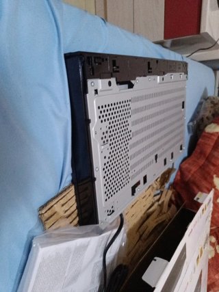 Consola Sony Negra y Plateada
